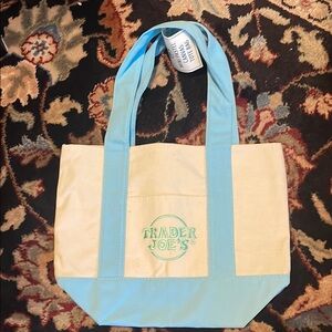 Elegant Blue and Cream Tote Bag with Canvas Design